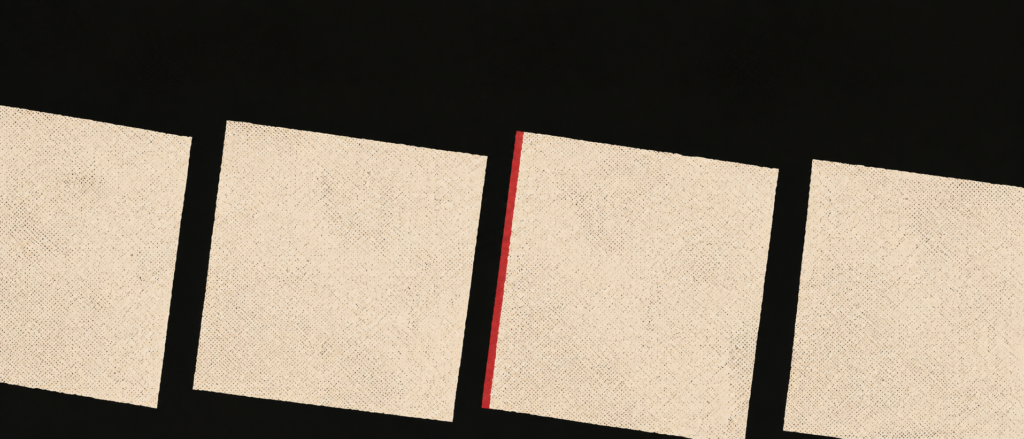 A row of blank bone panels with one red edge on black